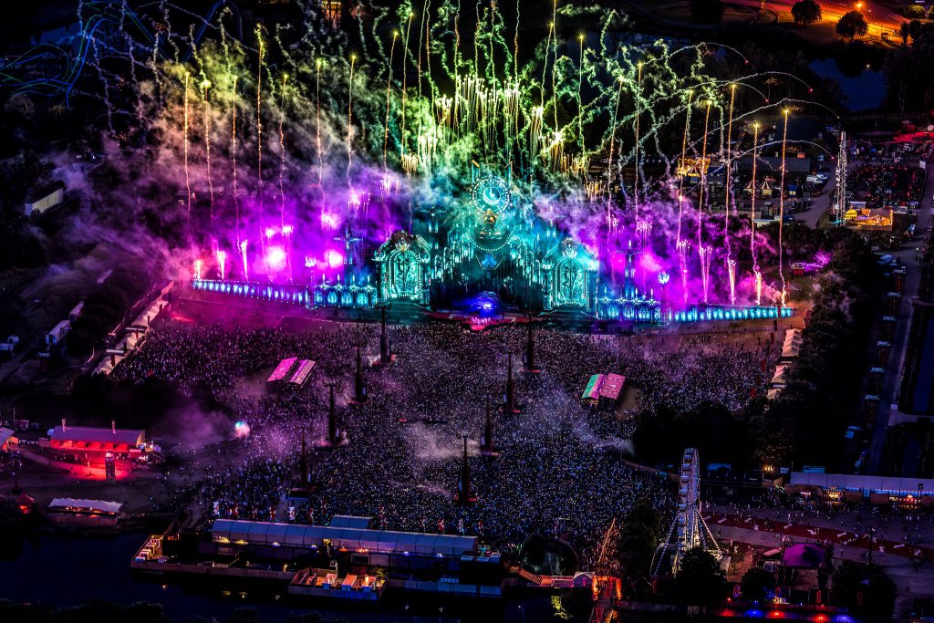 Defqon.1 2025 Biddinghuizen Red en Blue stage lights, our Production People crew provided, installed and operated the lights, technisch AV bedrijf, Backbone International en Q-Dance. top view picture of the Red stage with blue and purple lights at night.