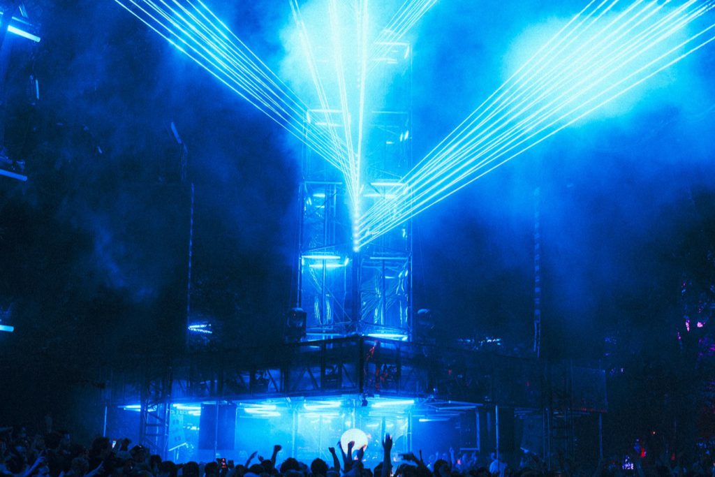 Awakenings Summer Festival 2025 Beekse Bergen, Production People provided light and for area X, Y, A and festival site and sound for area X, A, B. this picture is of outdoor area A, a smokey tower in the forest, by night